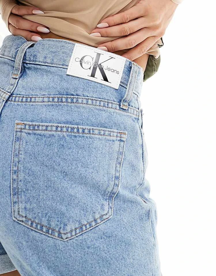 Calvin Klein Jeans Mom Denim Shorts In Mid Wash For Women Denim Medium 4 Calvin Klein Jeans Mom Denim Shorts In Mid Wash For Women Denim Medium - Image 4