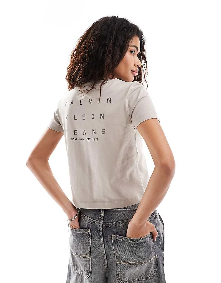 Calvin Klein Jeans Back Print Baby Tee In Beige For Women Goat 1 Calvin Klein Jeans Back Print Baby Tee In Beige For Women Goat