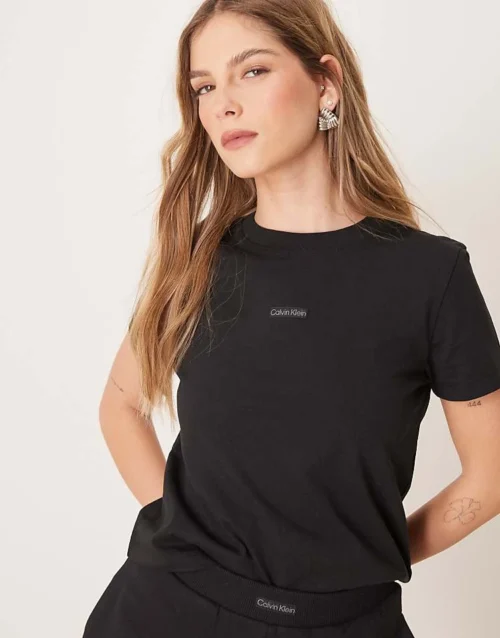 Home 38 Calvin Klein Jeans Institutional Graphic Baby Tee In Black For Women Ck Black