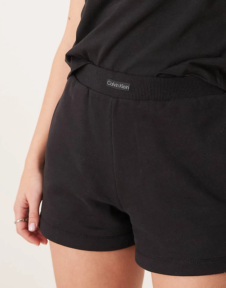 Calvin Klein Jeans Mini Logo Jersey Shorts In Black For Women Ck Black 3 Calvin Klein Jeans Mini Logo Jersey Shorts In Black For Women Ck Black - Image 3